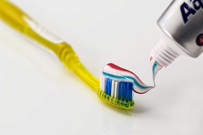 Toothpaste applied on toothbrush