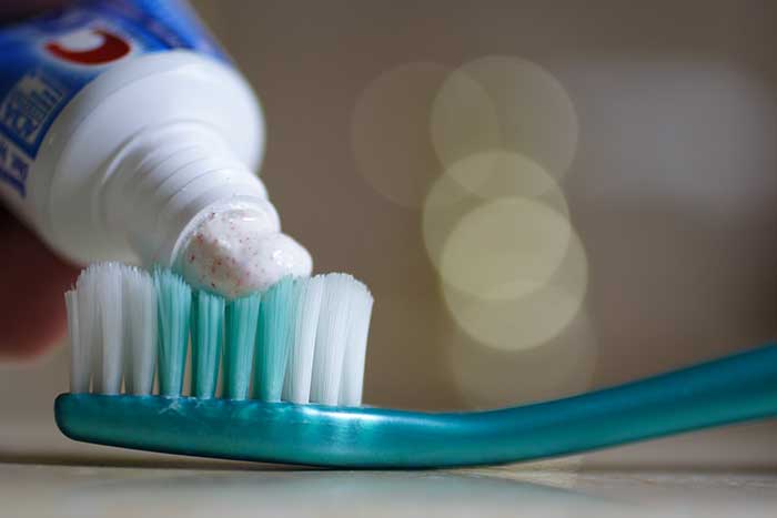 Toothpaste applied on brush